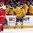 MONTREAL, CANADA - DECEMBER 26: Sweden's Carl Grundstrom #16 celebrates at the bench after scoring a second period goal against Denmark while Rasmus Andersson #10 looks on during preliminary round action at the 2017 IIHF World Junior Championship. (Photo by Andre Ringuette/HHOF-IIHF Images)

